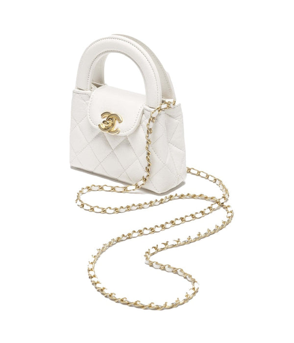 Pochette Chanel Kelly avec chaîne Micro 23K en cuir de veau vieilli brillant blanc