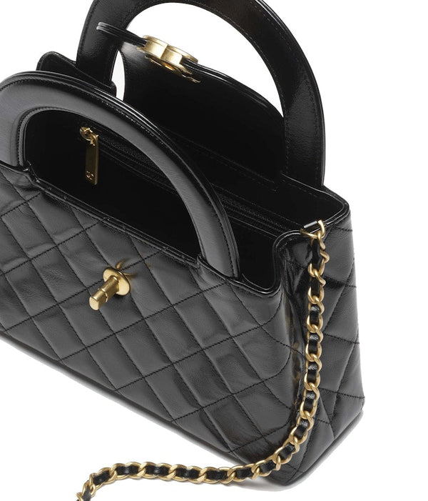 Sac shopping Chanel Kelly Mini en cuir de veau vieilli brillant 23 carats noir