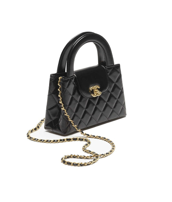 Sac shopping Chanel Kelly Mini en cuir de veau vieilli brillant 23 carats noir