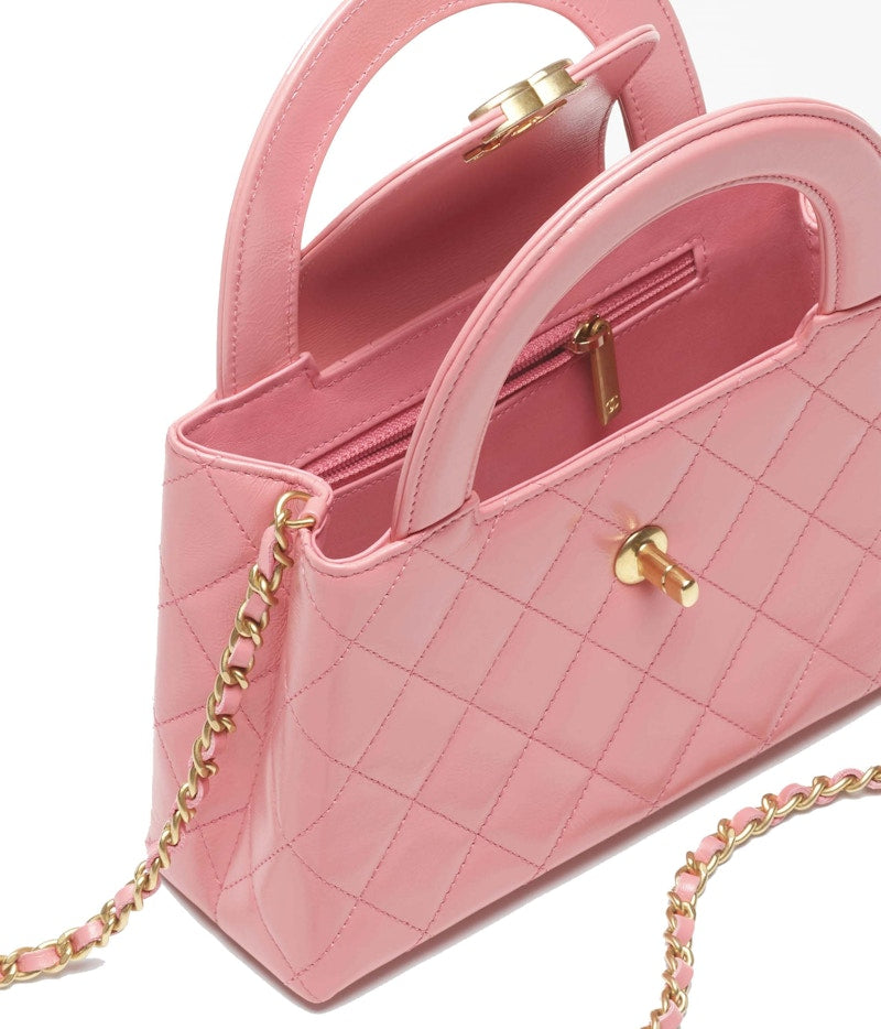 Sac shopping Chanel Kelly Mini en cuir de veau vieilli brillant 23 carats rose corail