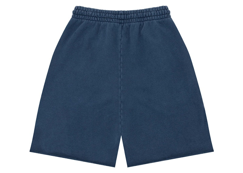 Short universitaire en denim bleu marine avec déchirures en denim