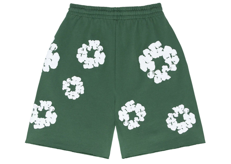 Short en denim déchiré par la couronne de coton vert