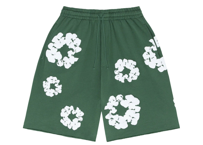 Short en denim déchiré par la couronne de coton vert