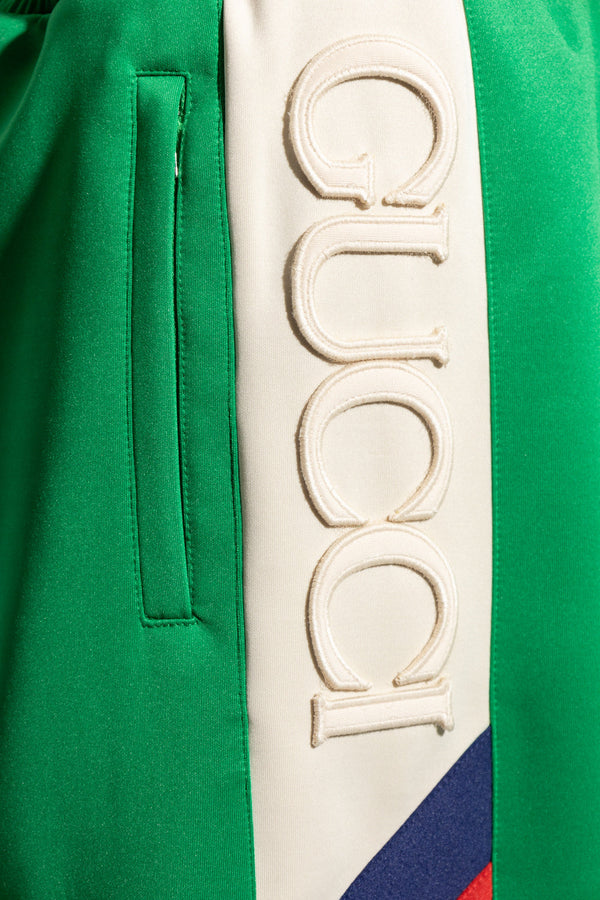 Short à rayures latérales et logo Gucci vert