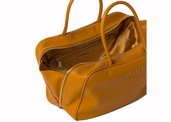 Miu Miu Leder-Tragetasche Granatapfelgelb