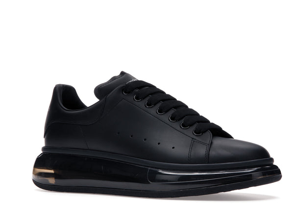Alexander McQueen – Übergroße schwarze Schuhe mit glänzender Sohle